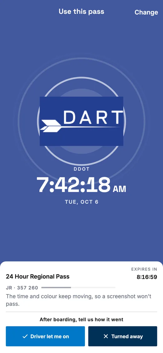 A Regional pass on a rider’s phone: the whole screen in Dart blue with the DART logo, and the time in large type